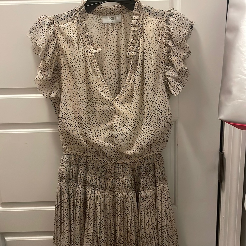 ruffle dress. has gold inlay. worn twice.